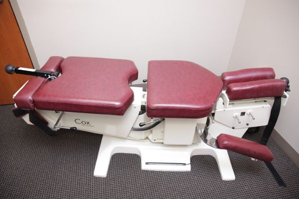 Image of a cox table in a chiropractor's office, which is used for sciatica treatment