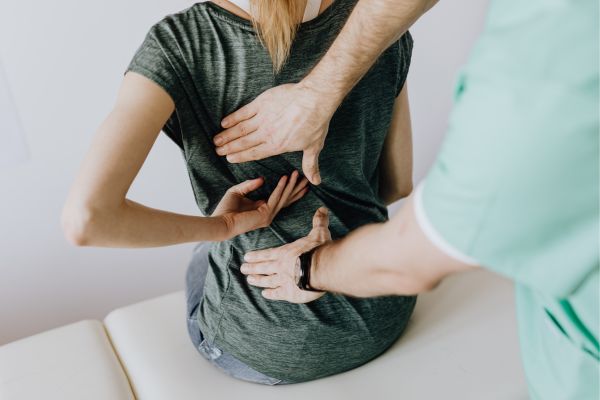 An auto accident chiropractor performs spinal manipulation