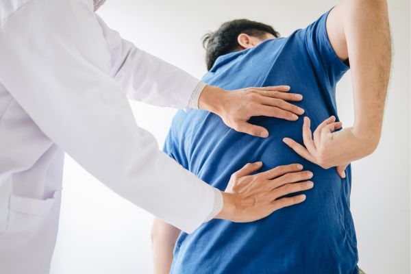 Doctor diagnosing a patient’s injury