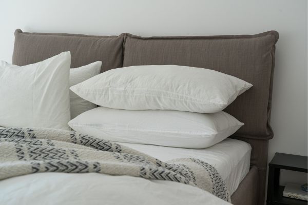 Pillows on bed causing sore neck from sleeping